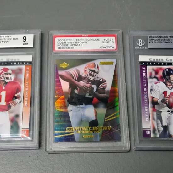 3 encased graded vintage NFL collector's cards - Chris Chandler, Warren Moon, Courtney Brown - slight damage to 1 case