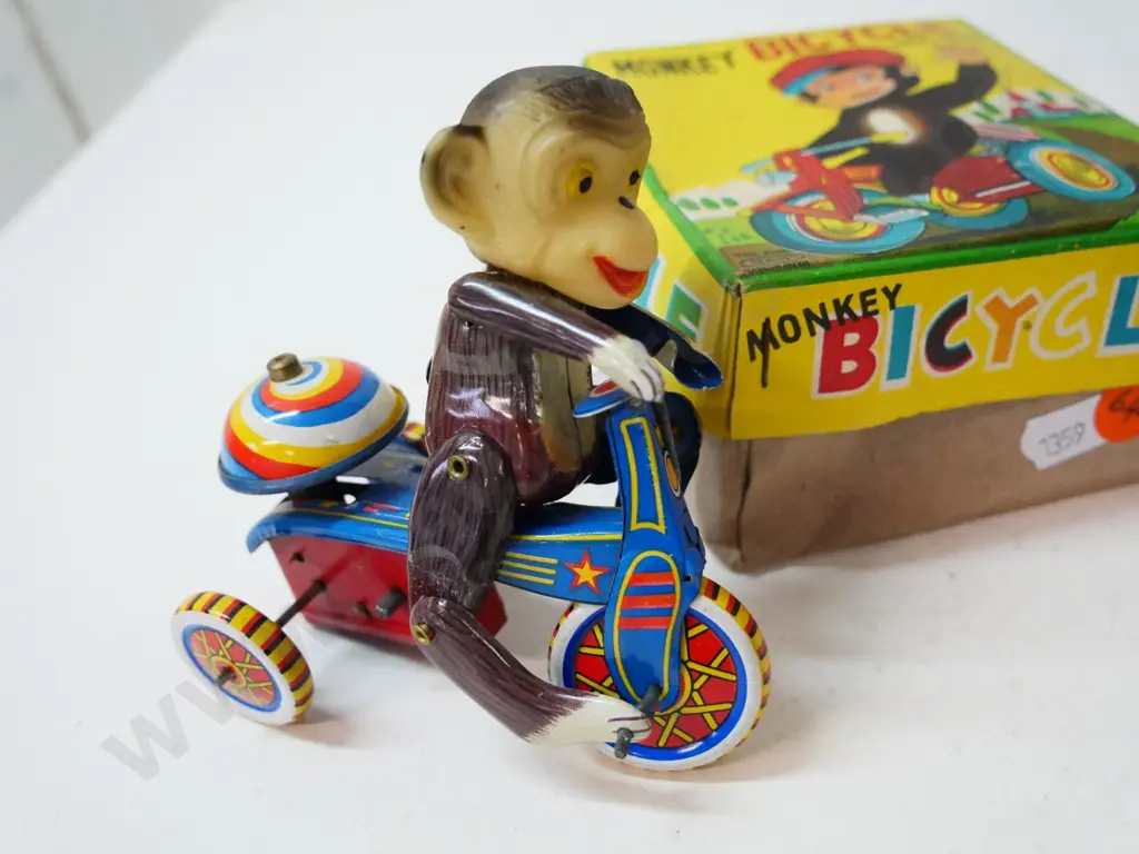 2 wind up tin toys - boxed monkey on a bicycle (Japan) and The Great Spider - both going Image 1++