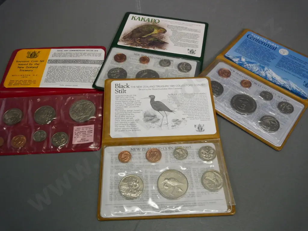 4 New Zealand cased collector coin sets - 1970 Royal Visit, 1985 & 1986 (Kakapo dollar) 1987 National Parks Image 1++