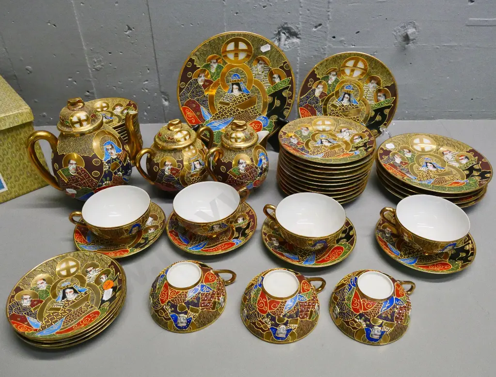 large quantity of Chinese 'lithophane' teaware - 7 trios, teapot, cream & sugar, assorted plates and numerous saucers Image 1++