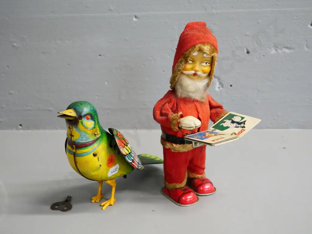 2 vintage wind-up toys - book-turning Santa in working order & bird, not working, key doesn't quite fit, slight damage Image 1++
