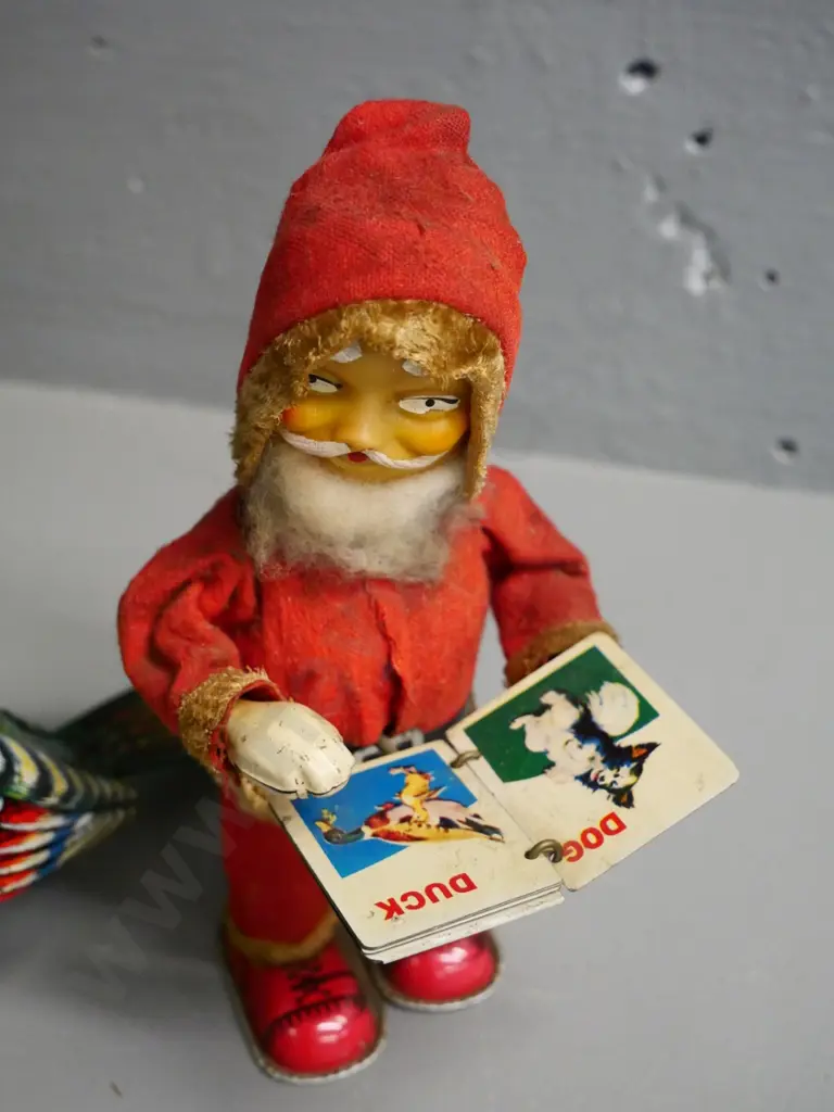 2 vintage wind-up toys - book-turning Santa in working order & bird, not working, key doesn't quite fit, slight damage Image 1++