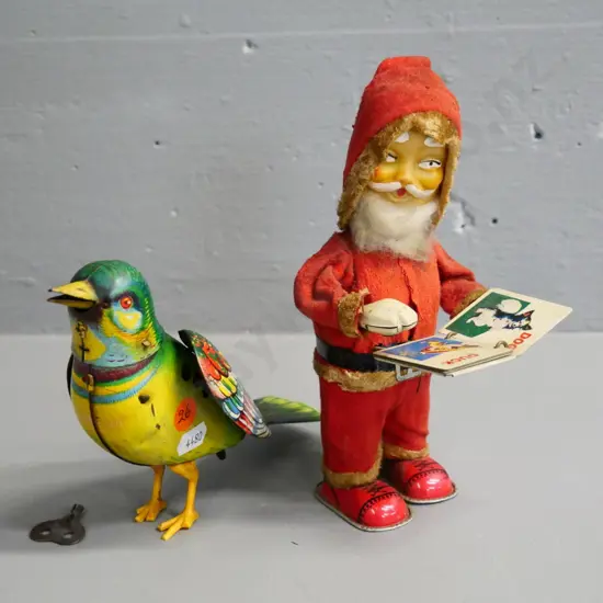 2 vintage wind-up toys - book-turning Santa in working order & bird, not working, key doesn't quite fit, slight damage