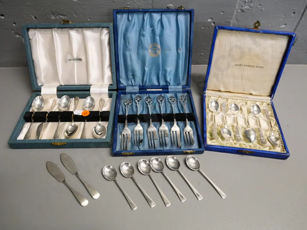 sterling silver cutlery - 3 cased sets, 2 butter knives and 6 coffee spoons Image 1++