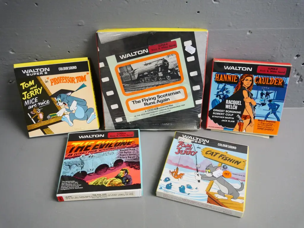 Five Super 8 films in original boxes, some sealed - Tom & Jerry x2, Raquel Welch, Witchfinder General etc. Image 1++