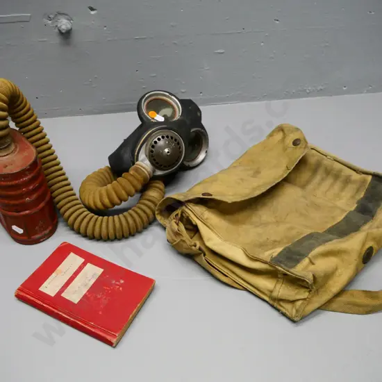 vintage military gas mask and bag, with hand-written notebook - seamanship & gunnery