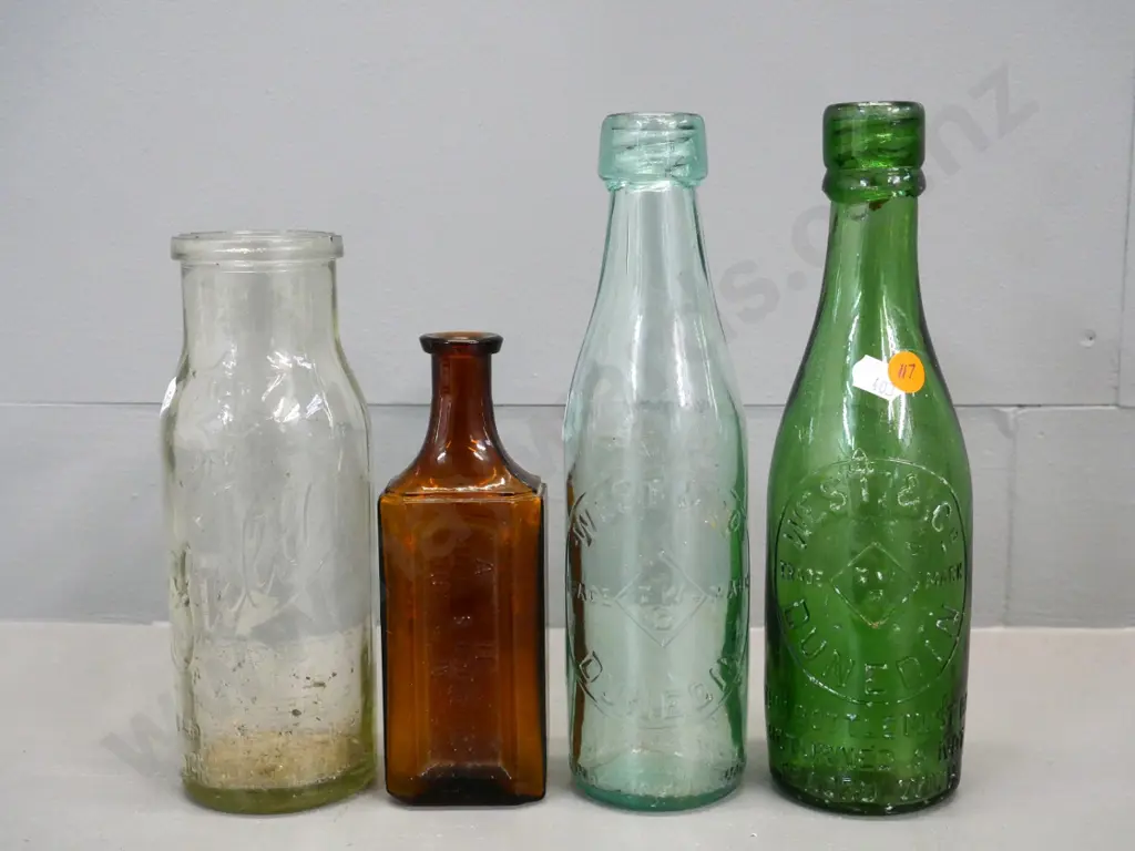 4 vintage Dunedin bottles - two West & Co H-240, Stella Preserves, and A.M. Hendy hair specialist Image 1++