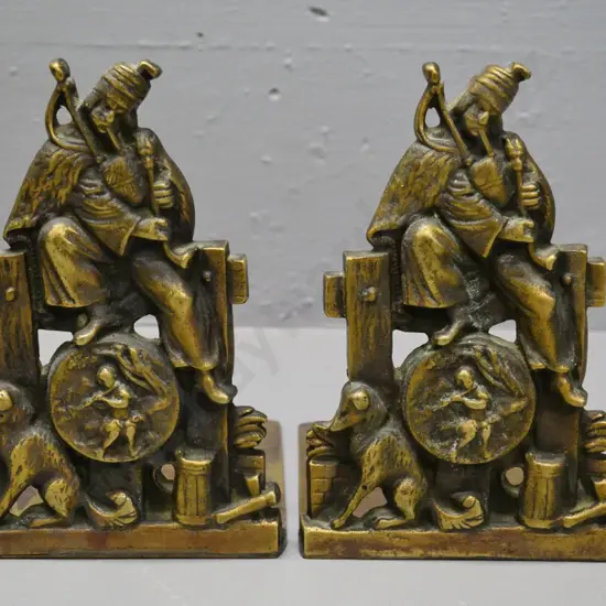 pair of brass minstrel-motif book-ends H-180