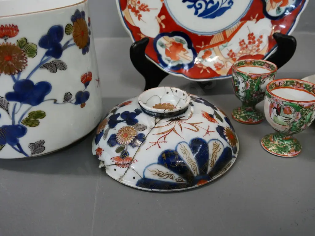 assorted antique china - Imari cup & saucer, Imari lidded pot with heavy mending to lid, plate and 2 eggcups w/damage Image 1++