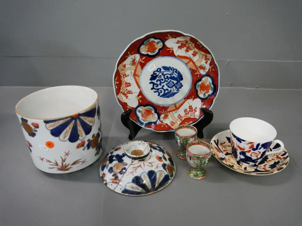 assorted antique china - Imari cup & saucer, Imari lidded pot with heavy mending to lid, plate and 2 eggcups w/damage Image 1++