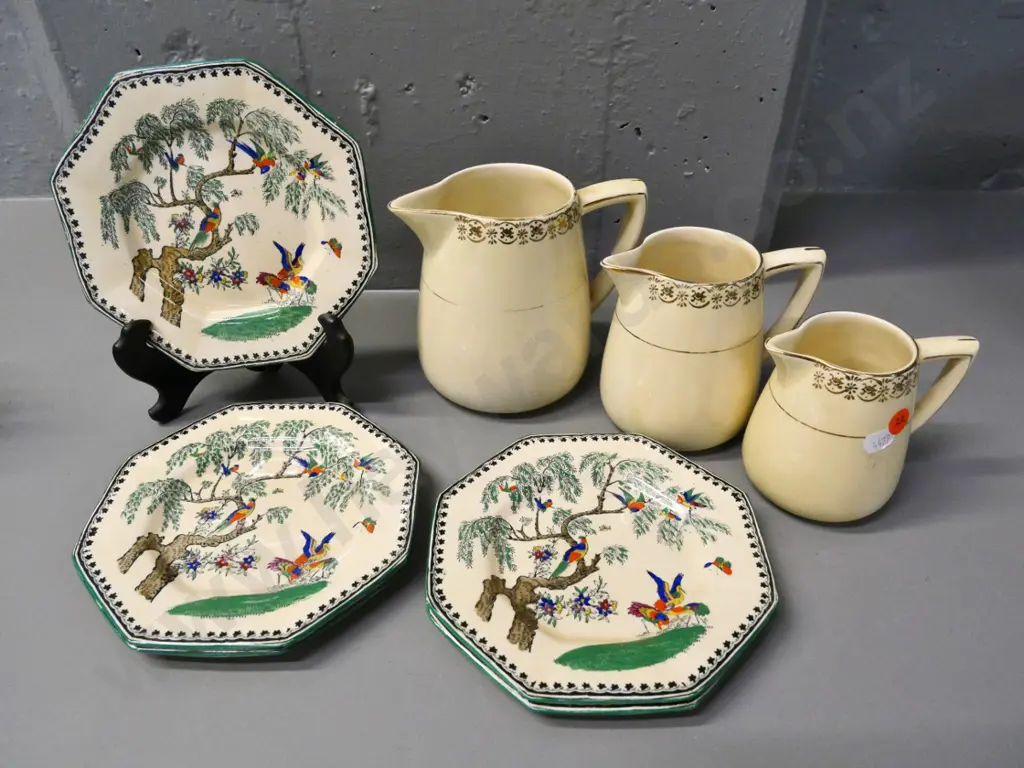 3 graduated Clarice Cliff jugs - some wear to gilding - and 5 Masons Koro pattern side plates Image 1++