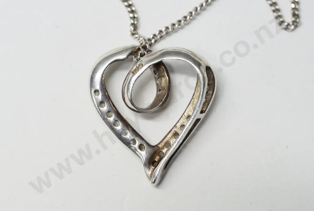 silver & cz heart shaped pendant stamped 925 Image 1++