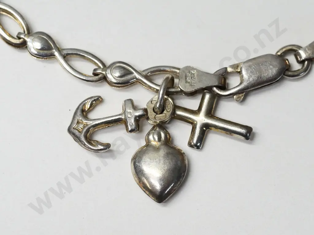 silver bracelet with small heart, cross & anchor stamped 925 Italy Image 1++