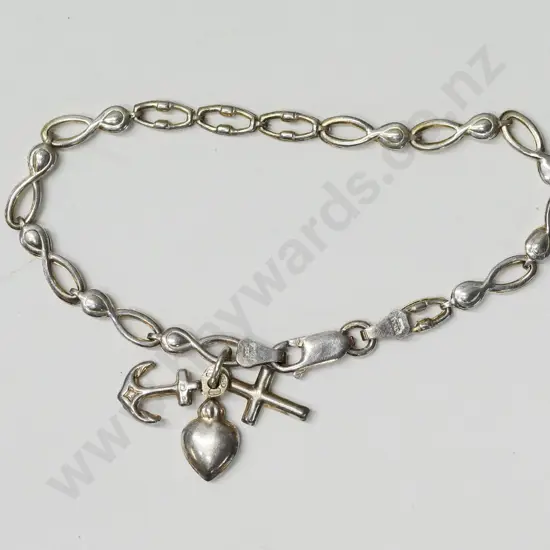 silver bracelet with small heart, cross & anchor stamped 925 Italy
