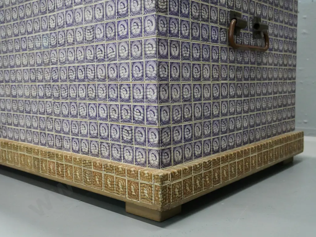 vintage storage trunk covered in Queen Elizabeth postage stamps, with metal handles & plate glass top H460 W930 D450 Image 1++
