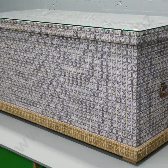 vintage storage trunk covered in Queen Elizabeth postage stamps, with metal handles & plate glass top H460 W930 D450