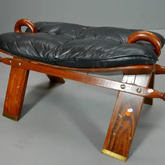 camel seat/stool with black leather upholstery, brass inlay detail H-400 W-750 L-340
