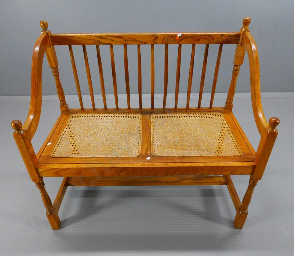 reproduction oak hall seat with bergere cane seat & spindle back H880 W950 D480 Image 1++
