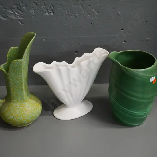 Sylvac and Crown Devon green jug vases and a white vase marked BCH. Crown Devon is H-280