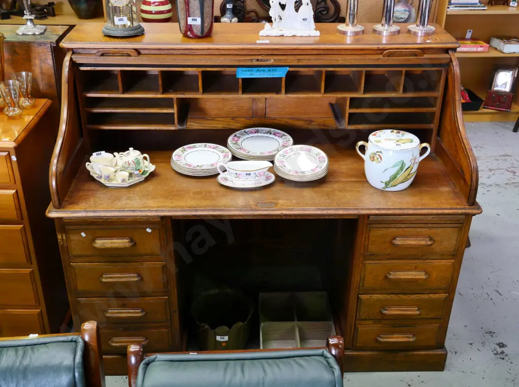 oak 8 drawer roll top desk with 2 pull out boards, some damage to varnish H-1240 W-1515 D-820 Image 1++