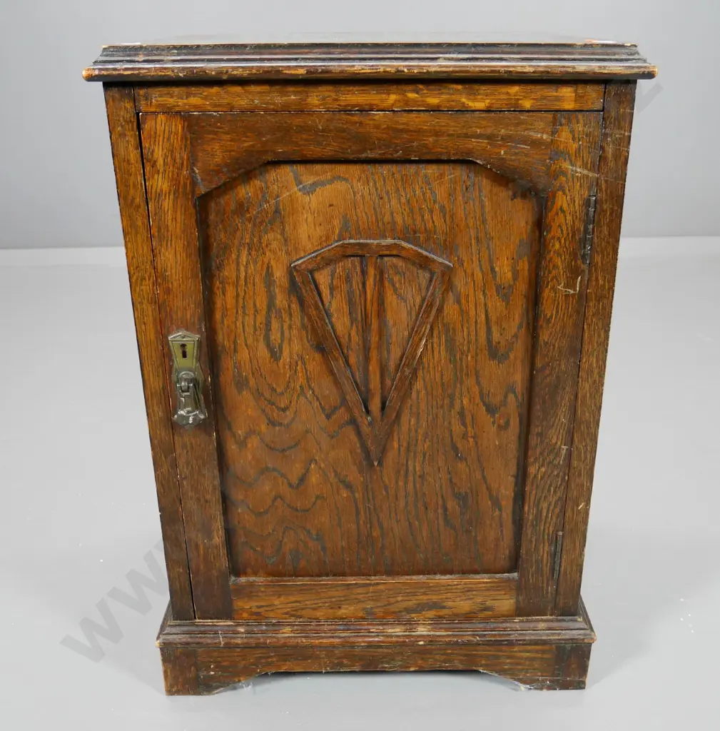 deco oak pot cupboard with brass drop handle, carved detail on door H-590 W-400 D-350 Image 1++