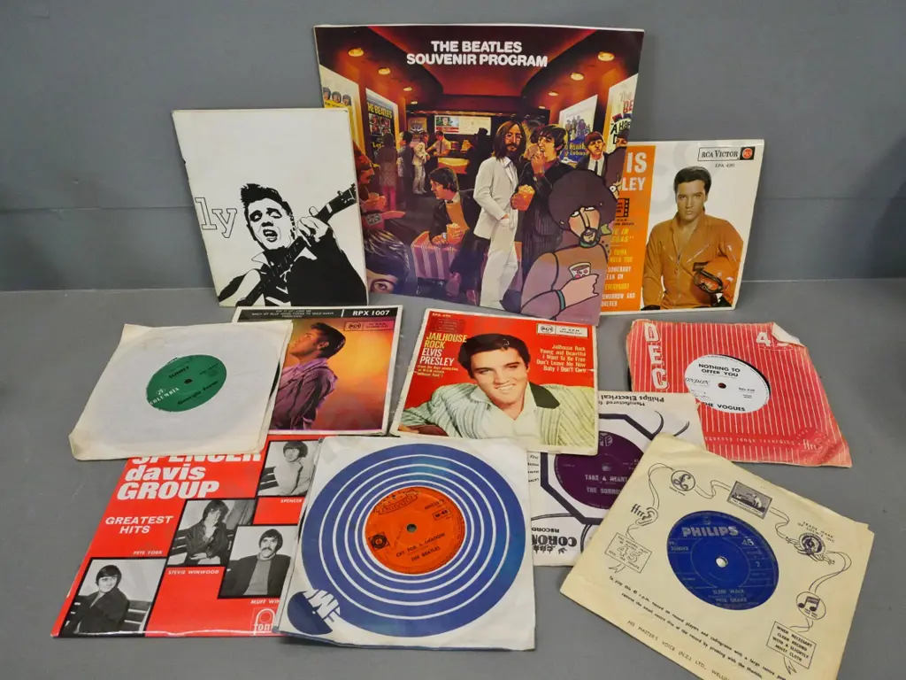 45 RPM records - Beatles, Vogues, Spencer Davis, Elvis, 1982 Beatles film souvenir catalog and Elvis booklet Image 1++