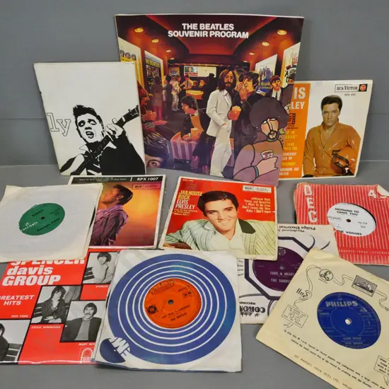45 RPM records - Beatles, Vogues, Spencer Davis, Elvis, 1982 Beatles film souvenir catalog and Elvis booklet