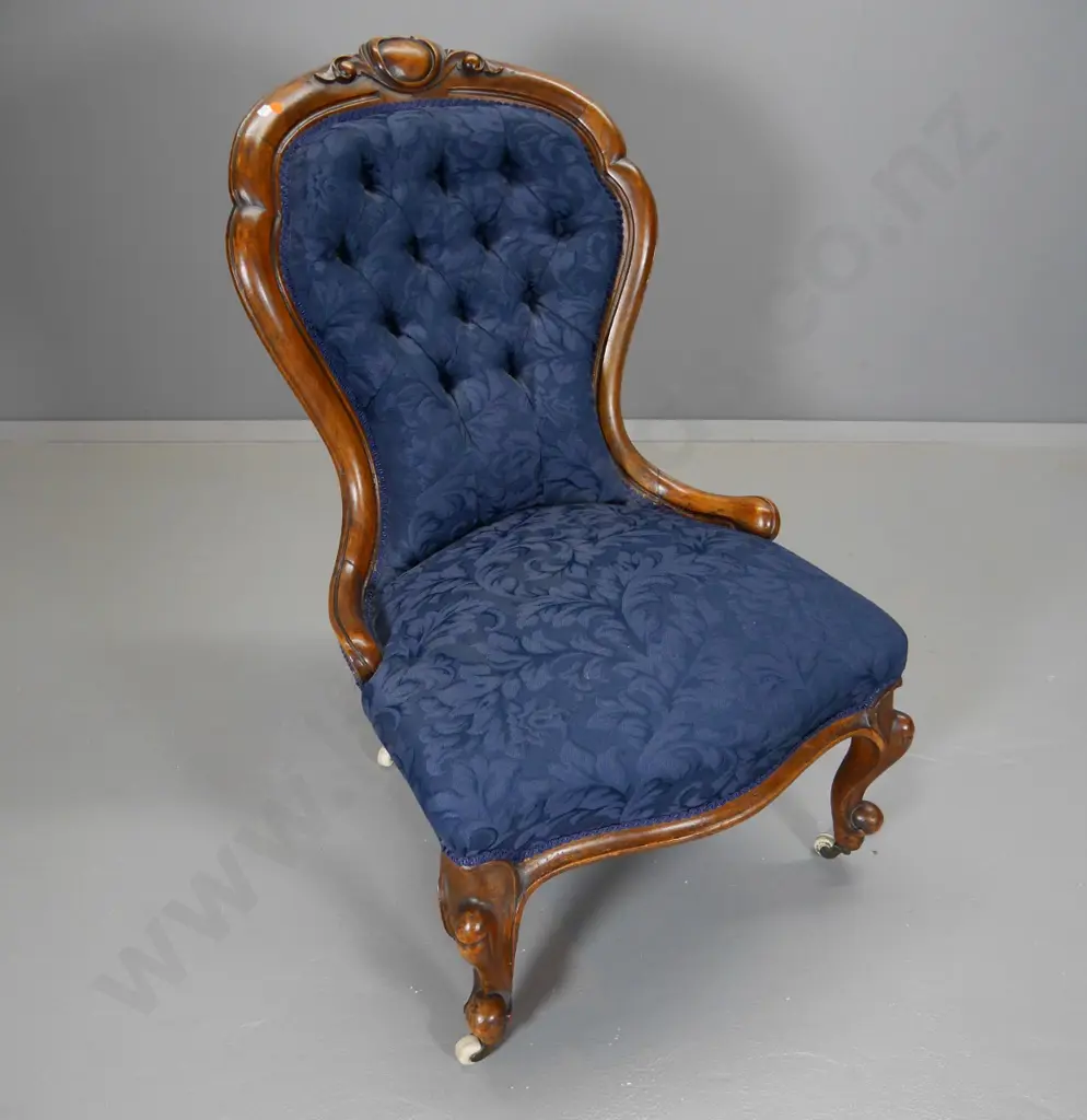 Victorian walnut carved back lounge chair w/deep-button back, blue damask, porcelain casters H930 W600 D650 Image 1++