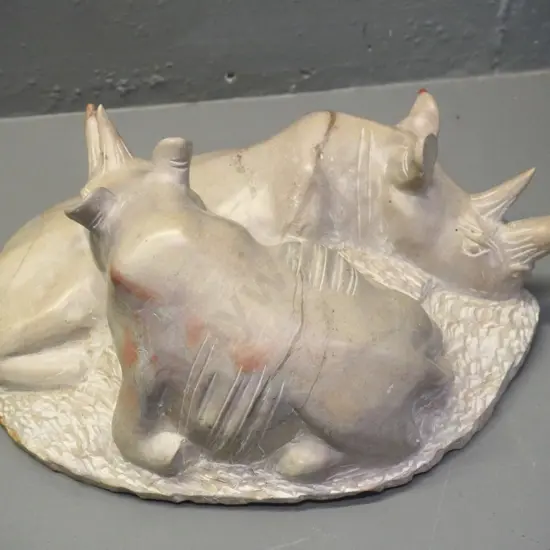 hand-carved stone figure of two rhinoceroses H-130 L-370
