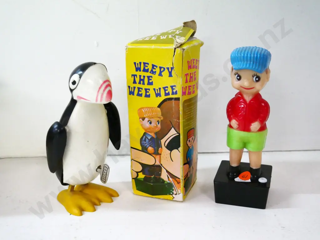plastic Weepy The Wee-Wee novelty figure (box in poor condition) and a wind-up plastic penguin in going order Image 1++