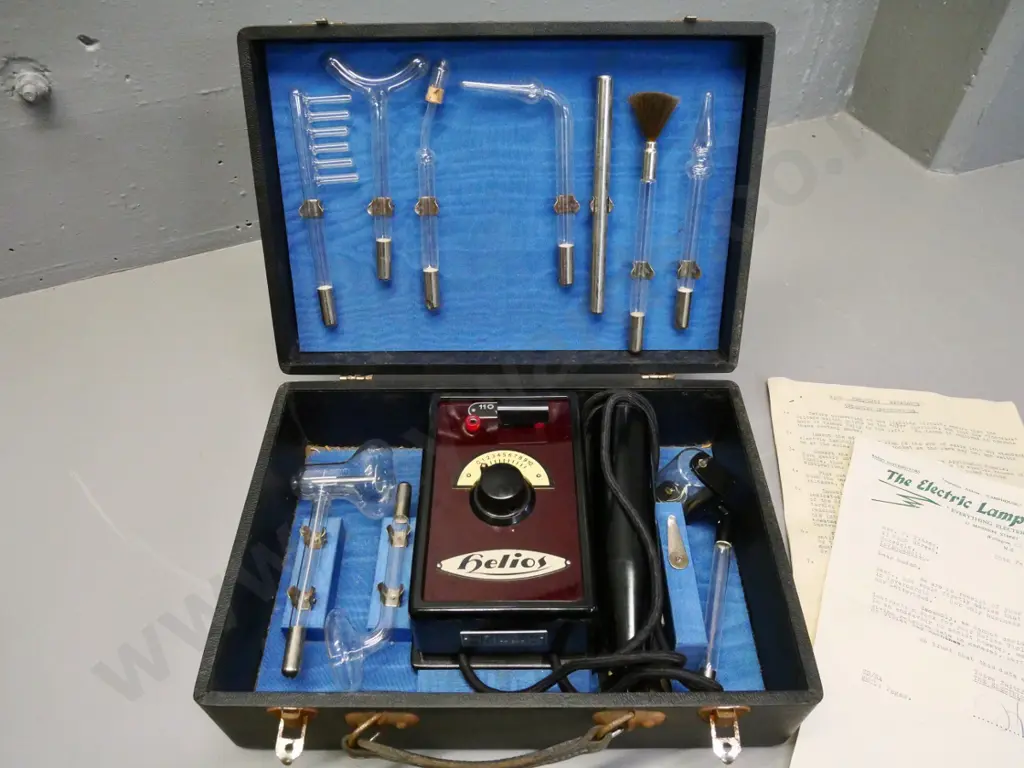 Helios "Violet Ray" therapeutical device with assorted glass attachments in fitted case H100 W330 D230 Image 1++