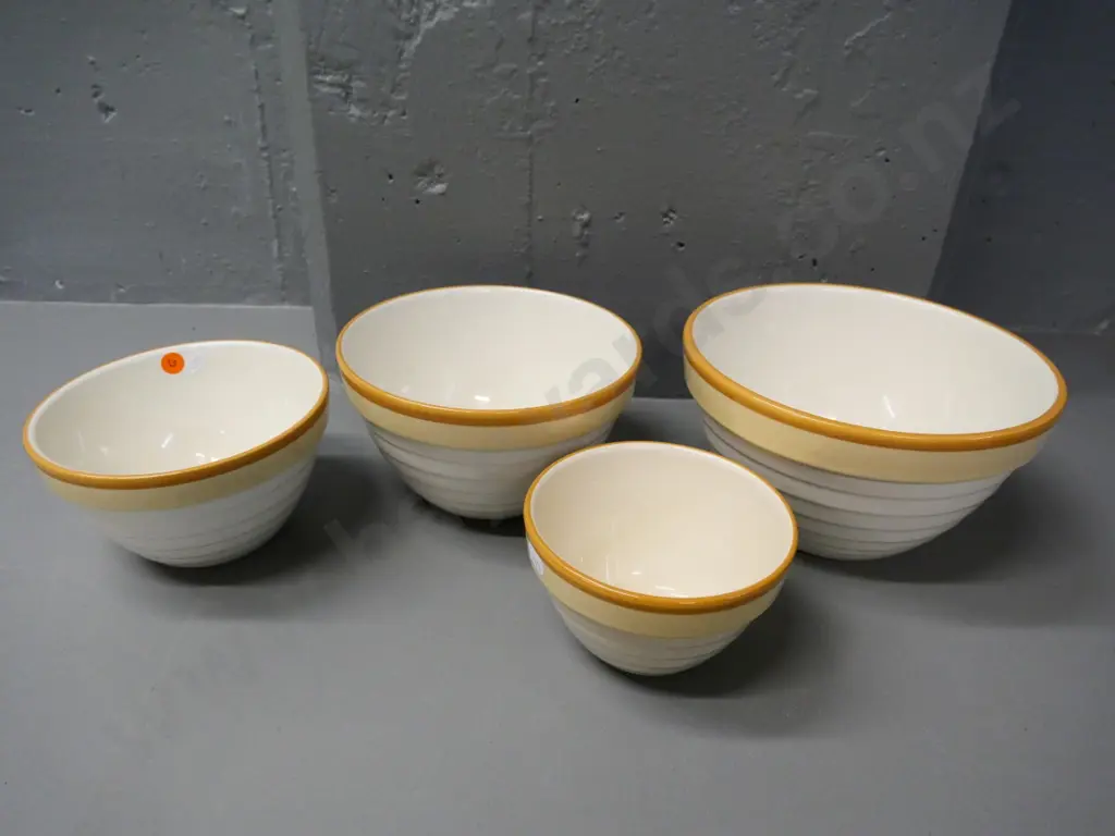 set of 4 NZ (Crown Lynn?) graduated mixing bowls - 2 have some interior glaze wear - largest is D-220 Image 1++