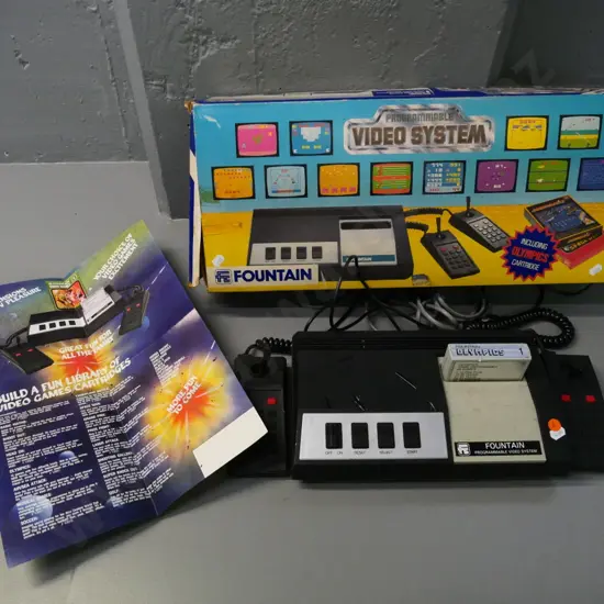 Fountain videogame console and Olympics cartridge, with original box - marks to plastic, untested