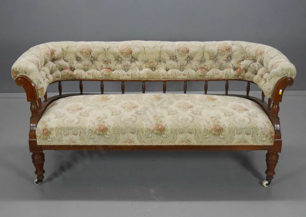 vintage spindle back deep-button settee with carved facings, porcelain casters, one loose - some fading H720 W1600 D560 Image 1++