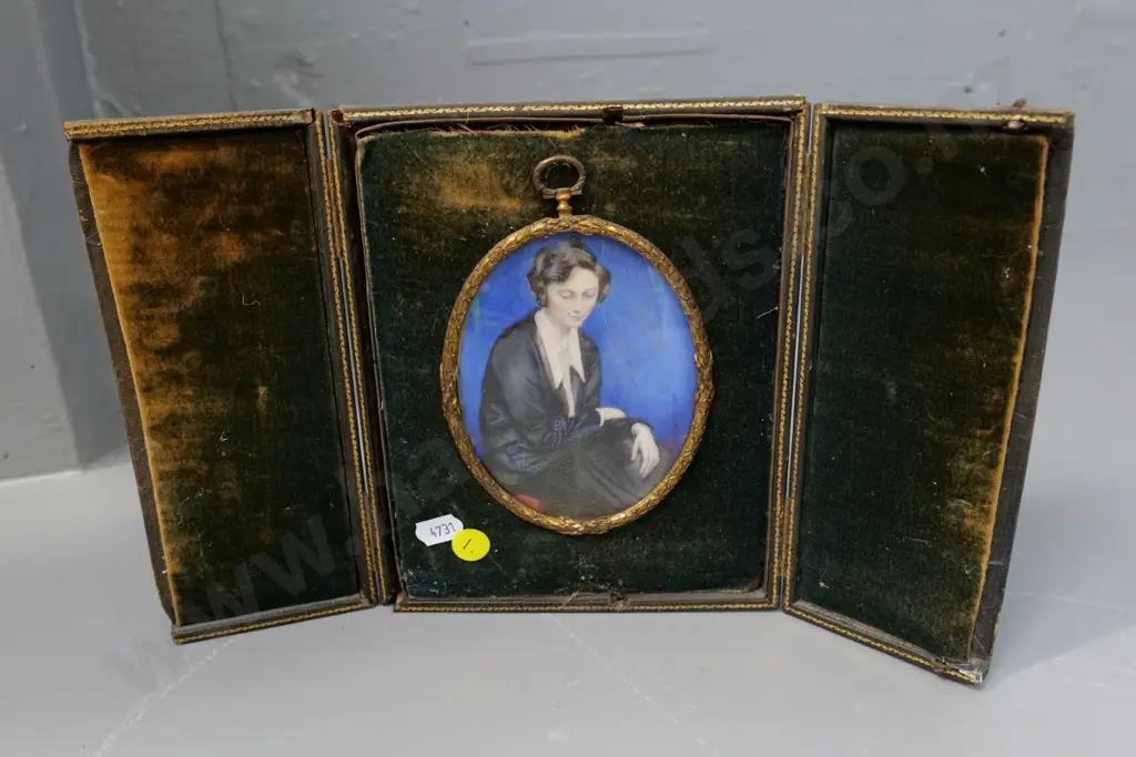 portrait in folding case frame - note in frame IDs as author Daphne Muir, likely painted in South Africa H200 W310 open Image 1++