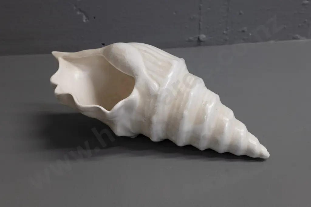 unmarked (Crown Lynn?) shell vase with glazed 'NZ' on side H-110 L-270 Image 1++