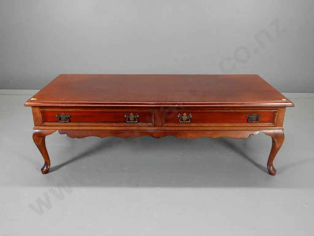 mahogany cab-leg coffee table - 2 drawers w/ metal drop handles - some shading to top H400 L1250 W530 Image 1++