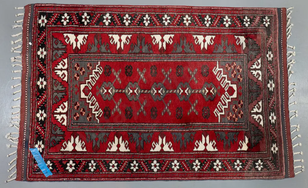 hand-knotted wool Persian style floor rug - red, black and cream - one end faded L-1600 W-1150 Image 1++