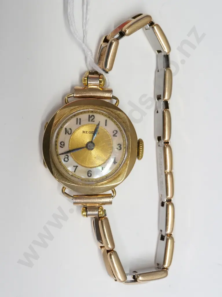 ladies 'Regent' gold watch with mother of pearl face stamped 375 Image 1++