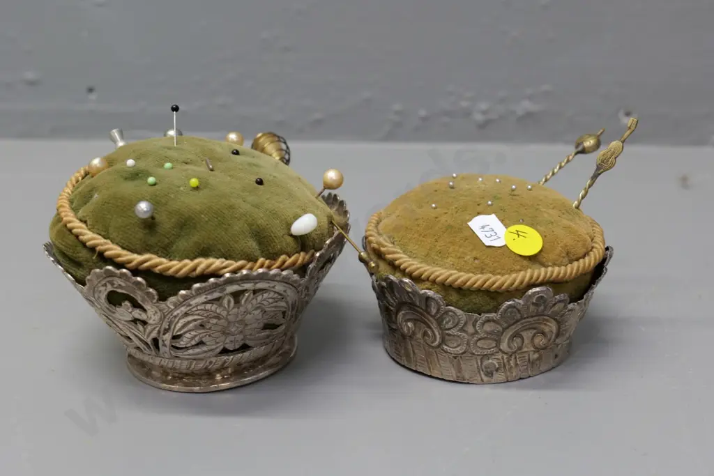 2 vintage pin cushions with pierced metal (silver?) holders and a few odd pins - larger is H-80 D-110 at widest Image 1++