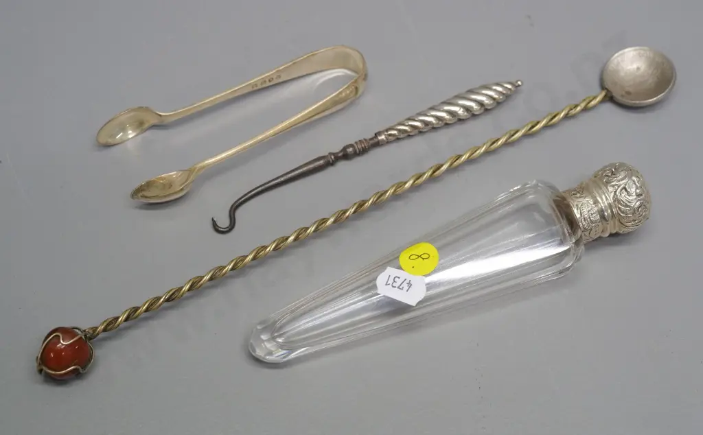 glass scent bottle with sterling silver cap, plated button hook, sugar tongs & Brazil coin spoon with agate in handle Image 1++