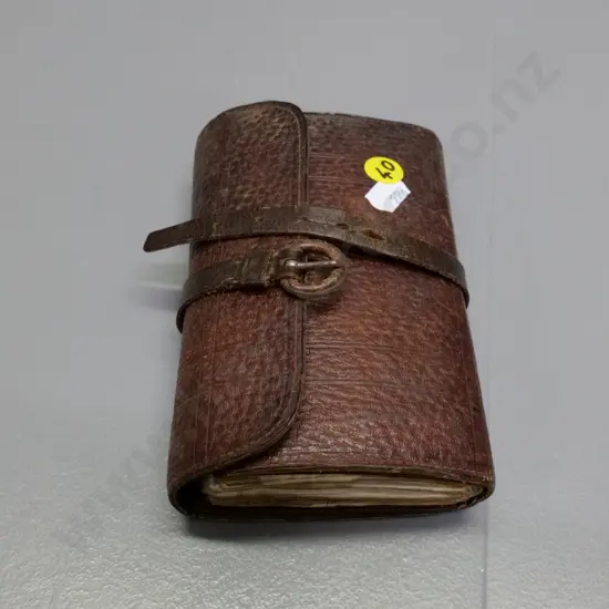 vintage fishing flies in leather wallet 100 x 150