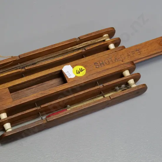 wood and bone shot and float holder, circa 1930s - engraved 'Shot and Caps' L-180 W-100
