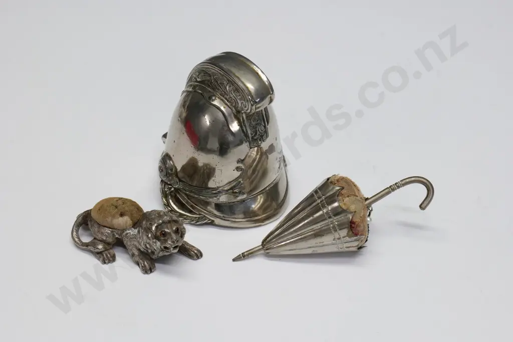 3 vintage novelty metal pin cushions - largest is hinged fireman's helmet 100 x 100, wear to fabric Image 1++