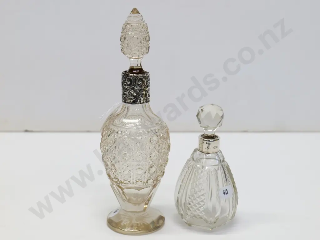 2 vinagrette bottles both with silver band stamped with lion & shield Image 1++