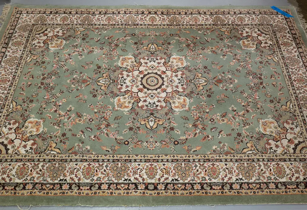 woven wool Persian style floor rug - pale green, cream, coral and black - some wear L-2440 W-1730 Image 1++