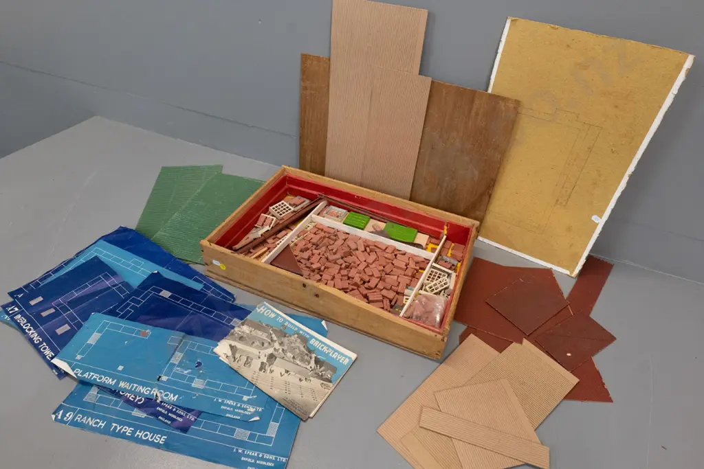 vintage Brickplayer building toy set with terracotta bricks, cardboard roof sections, blueprints, booklet etc. Image 1++