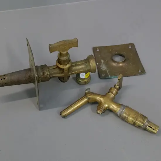 2 vintage cast brass taps - one w/ threaded faucet marked FS&T Loftus London, one with keg style faucet has had repair