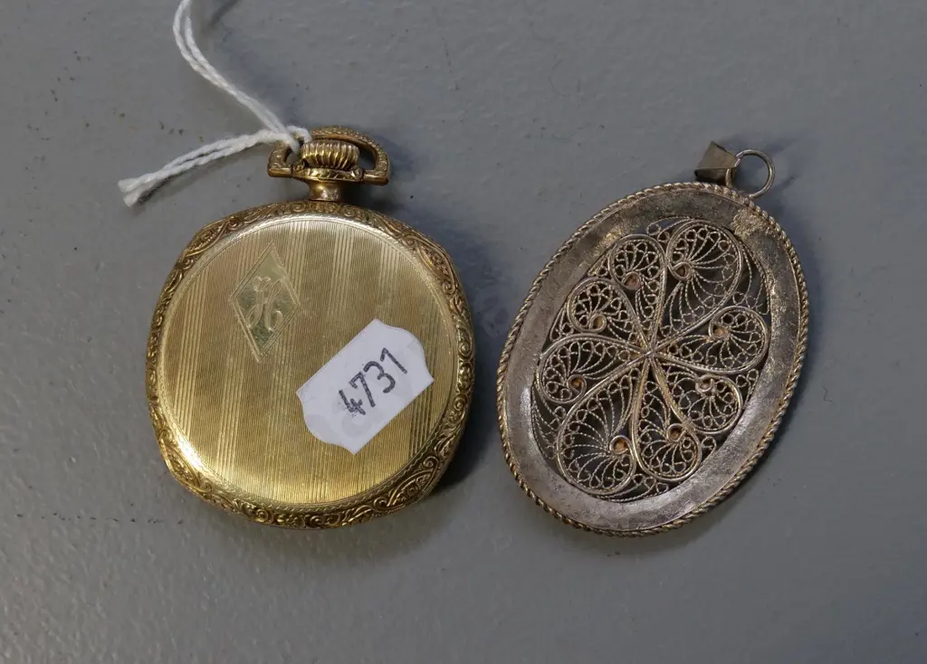 vintage Waltham pocket watch in gold metal case and a filigree silver pendant Image 1++