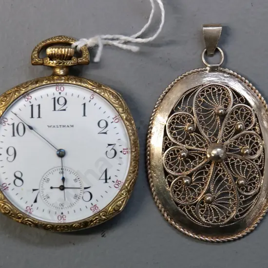 vintage Waltham pocket watch in gold metal case and a filigree silver pendant